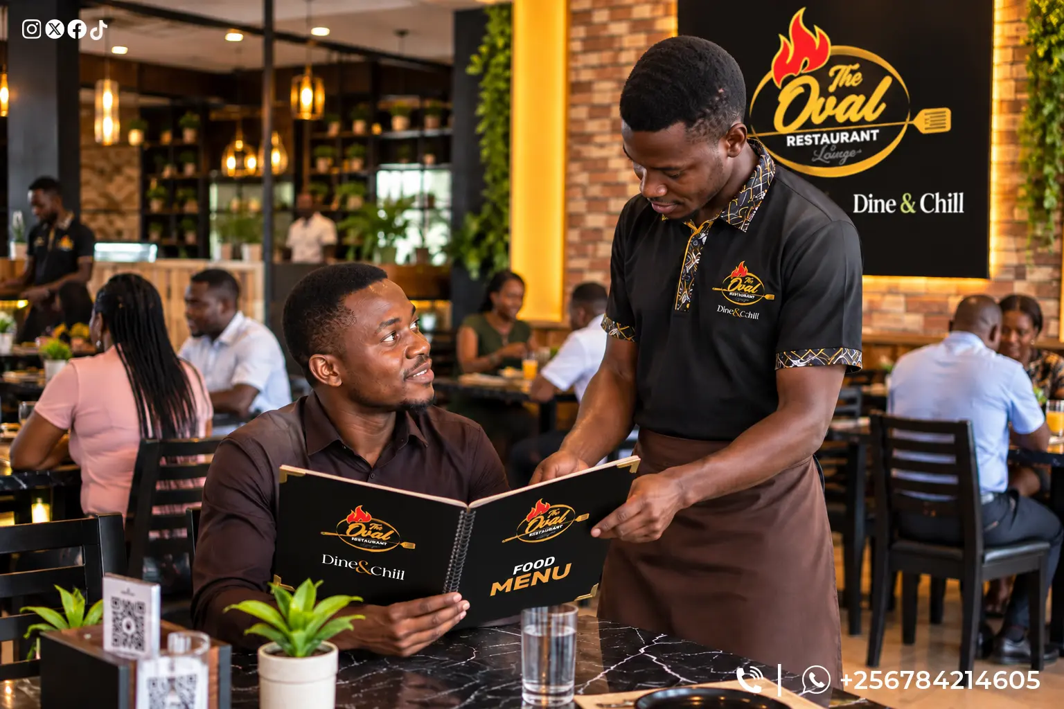 Oval waiter taking a guest through the Dine & Chill food menu at the table